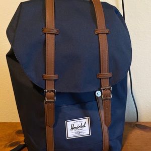 Blue Herschel backpack